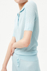 T-shirt de polo de Podel en laine pour femmes