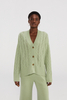 Cardigan en cachemire pur chic avec bouton