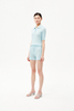 T-shirt de polo de Podel en laine pour femmes